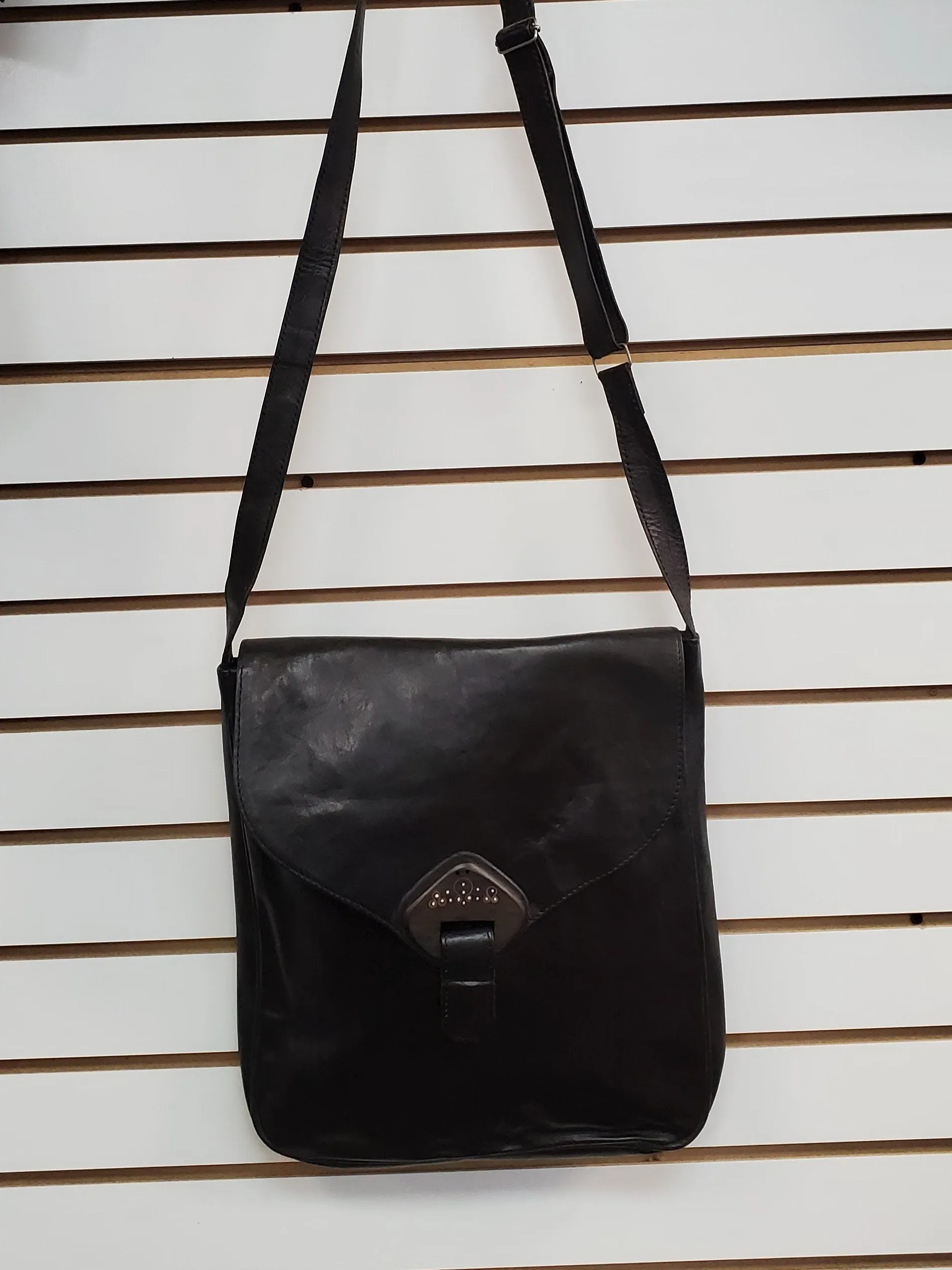 Crossbody Leather Bag with adjustable strap and lined with Ankara 19"x15.5".