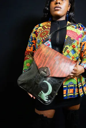 Crossbody Leather Bag with adjustable strap and lined with Ankara 19"x15.5".