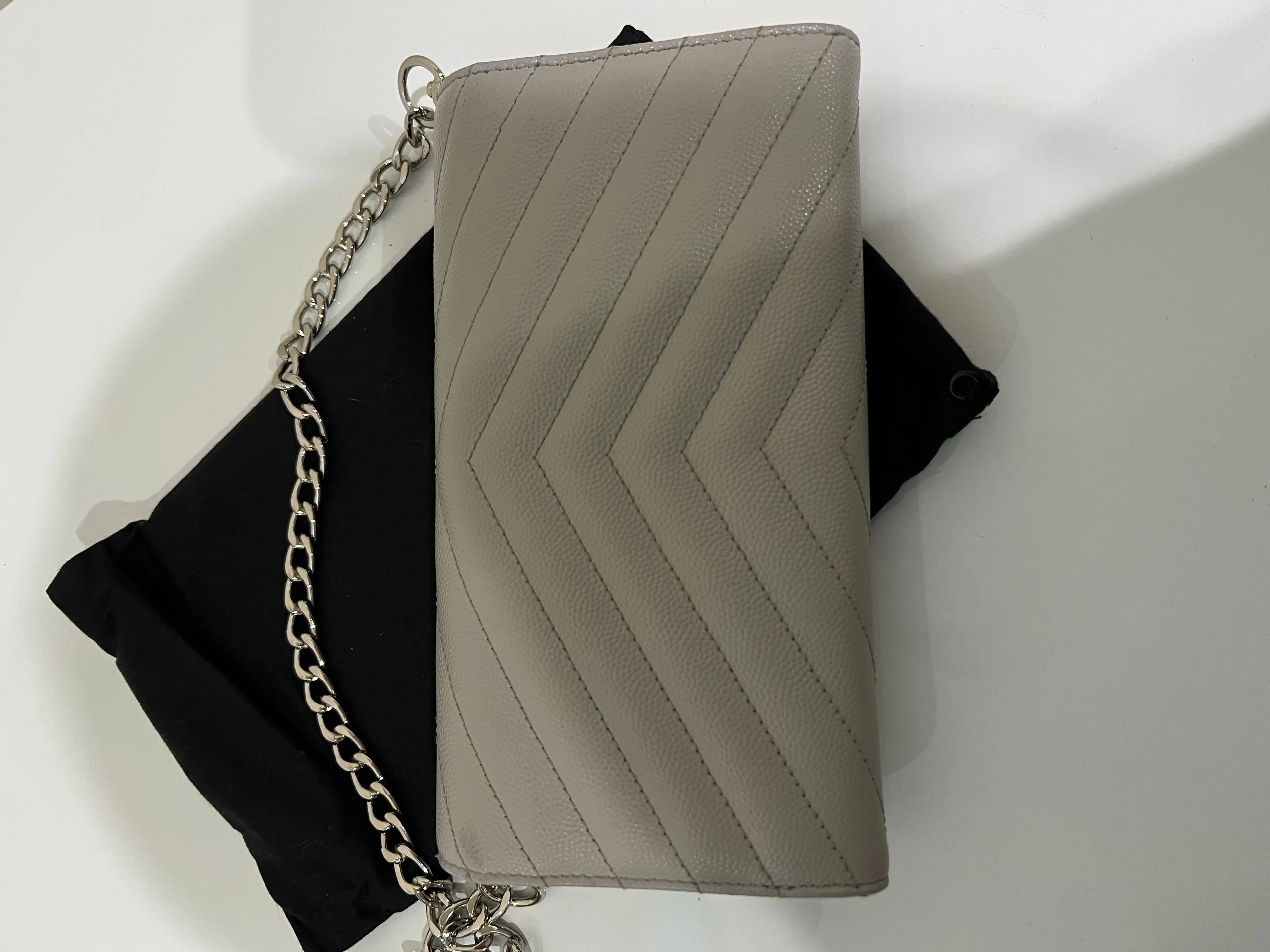 Grey YSL monogram wallet on chain
