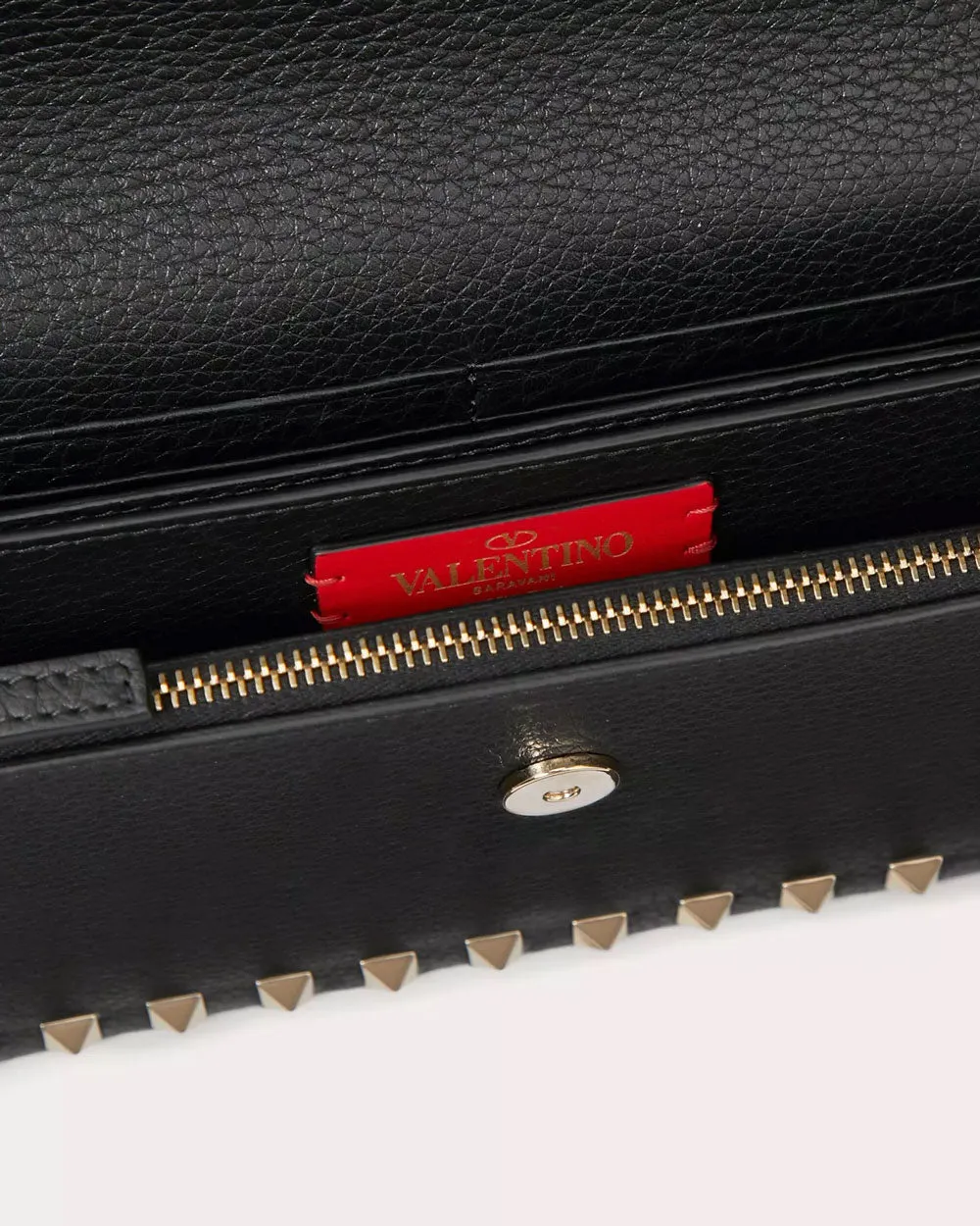 Rockstud Grainy Calfskin Pouch in Black