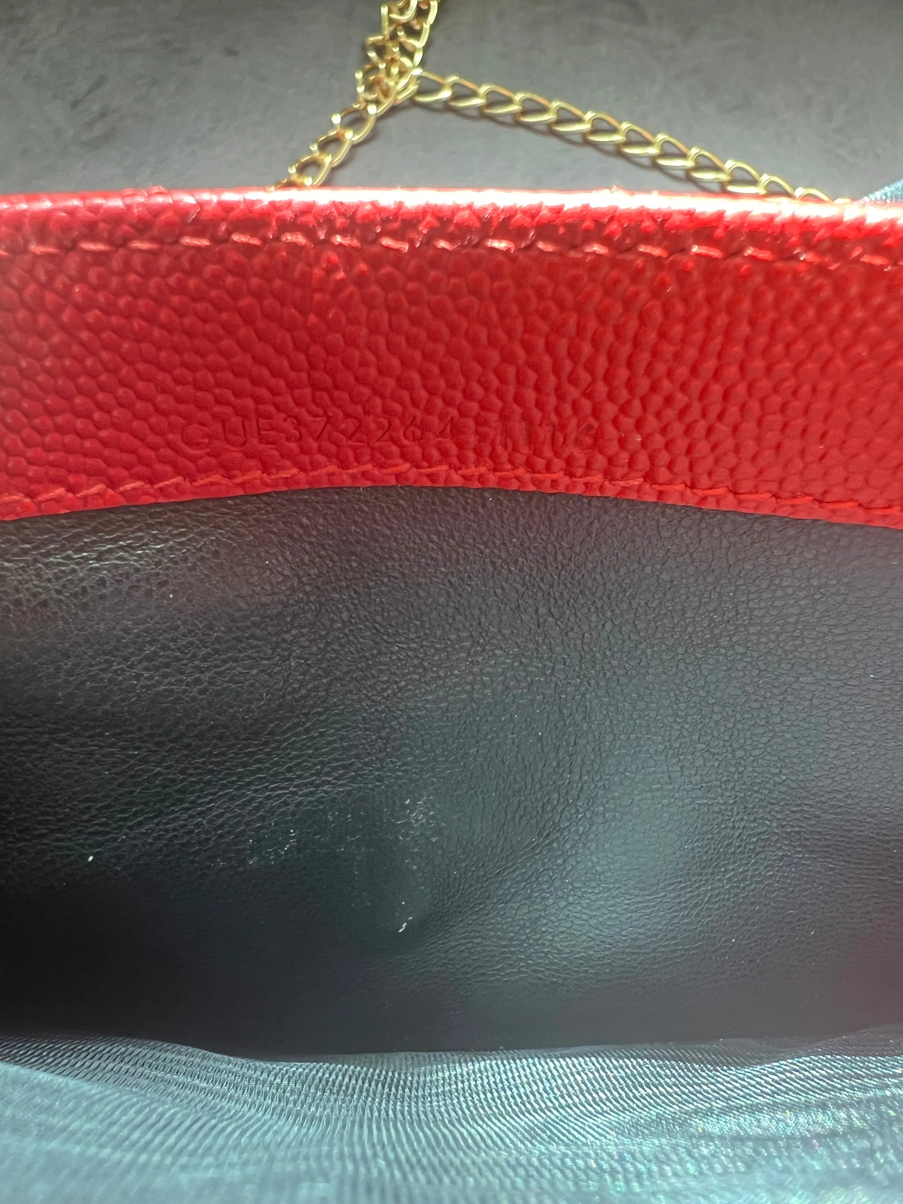 Yves Saint Laurent Cassandre envelope wallet on chain red