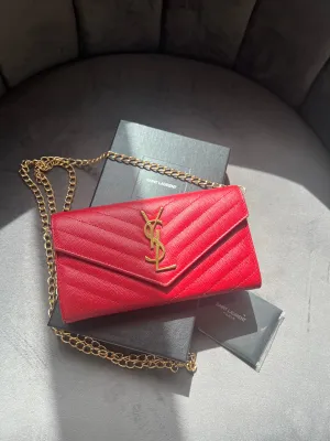 Yves Saint Laurent Cassandre envelope wallet on chain red